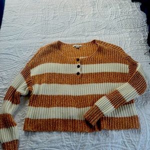 White and orange/yellow fall sweater